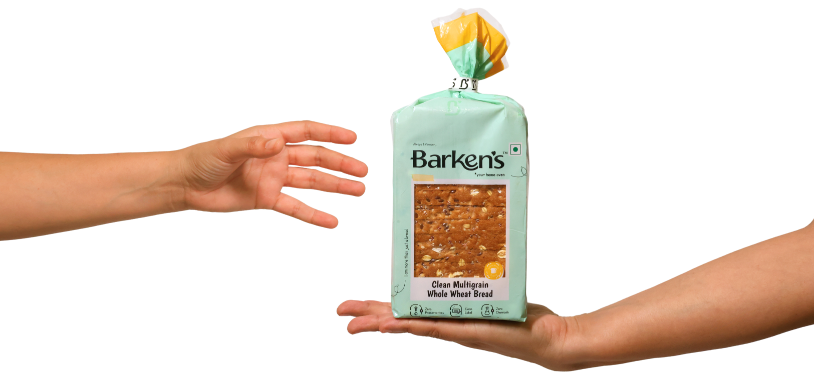 Hands exchanging a pack of Barken’s Clean Multigrain Whole Wheat Bread, symbolizing subscription to India’s Cleanest Bread.